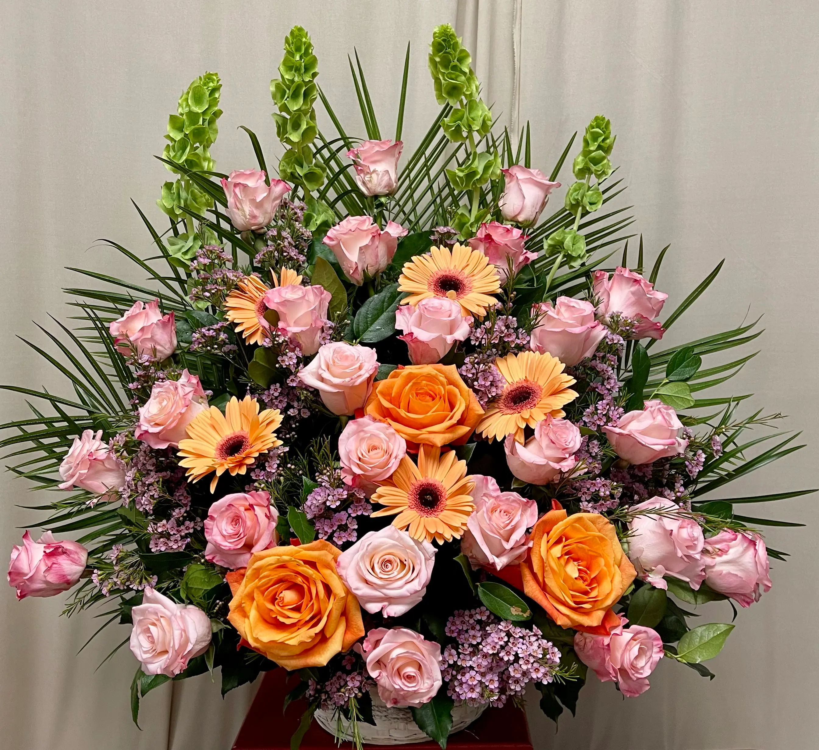 Peach and Light Pink Rose Basket Arrangement