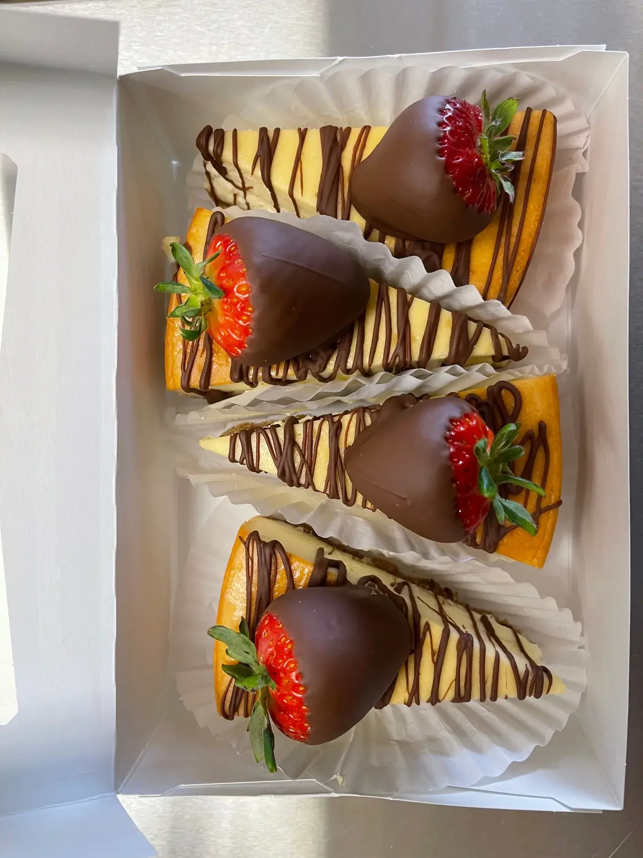 Chocolate drizzled cheesecake with chocolate dipped strawberry – photo 2