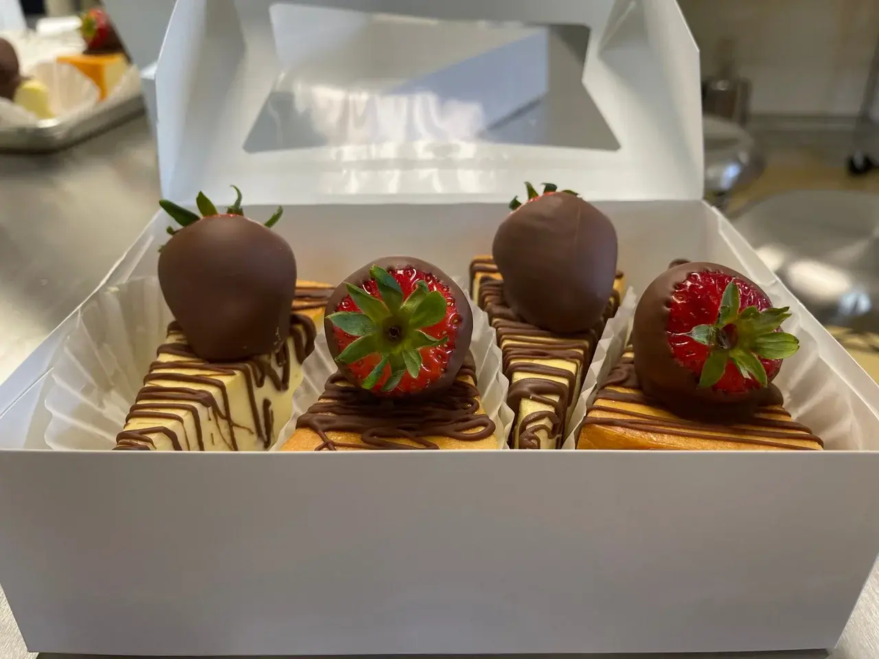 Chocolate drizzled cheesecake with chocolate dipped strawberry – photo 3