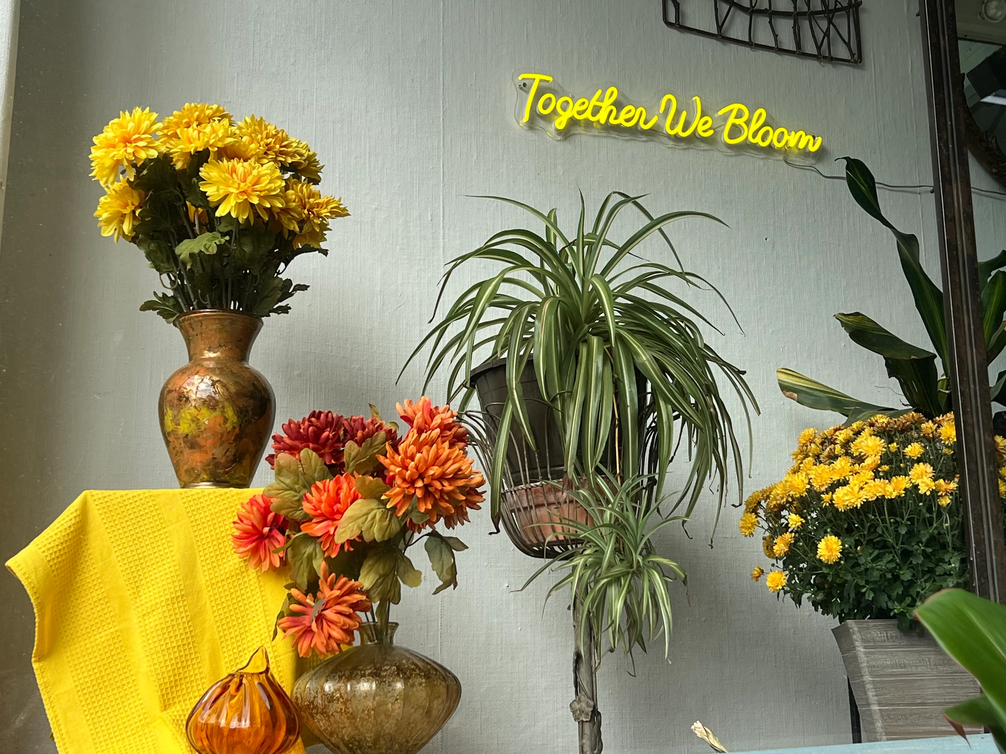 Westside Flowers "Together We Bloom" neon sign