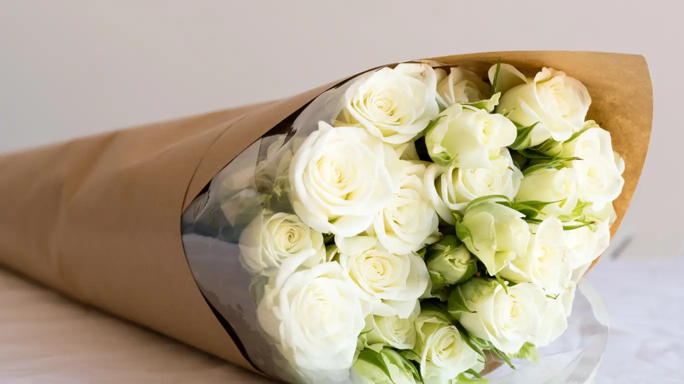  Beautiful white Roses wrapped bouquet. in  , undefined undefined